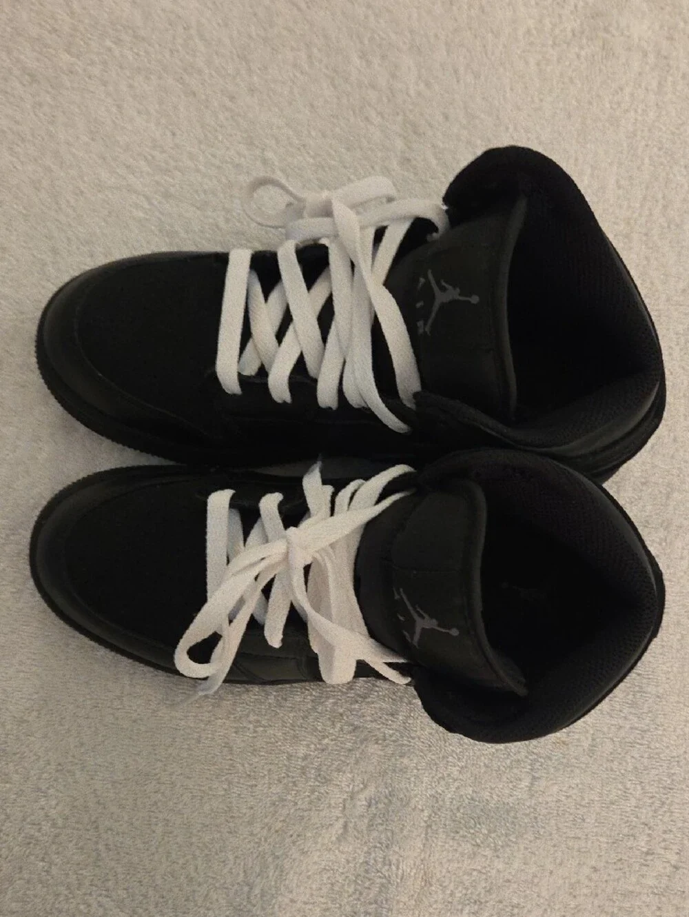 Jordan Kids Black and White High-Top Sneakers